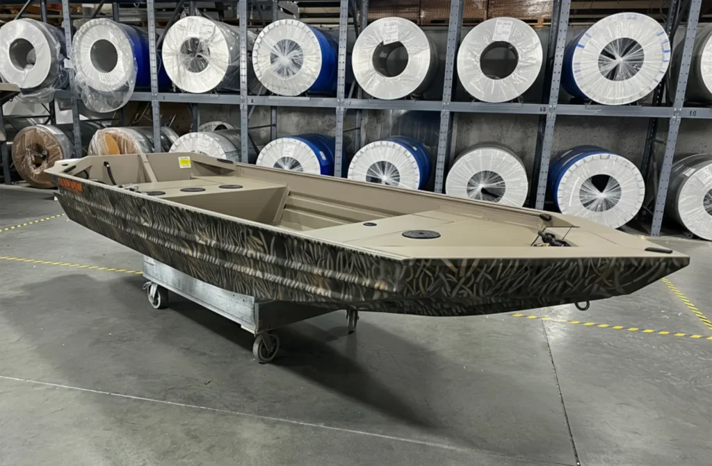 Marsh Tiller Series boat in the warehouse