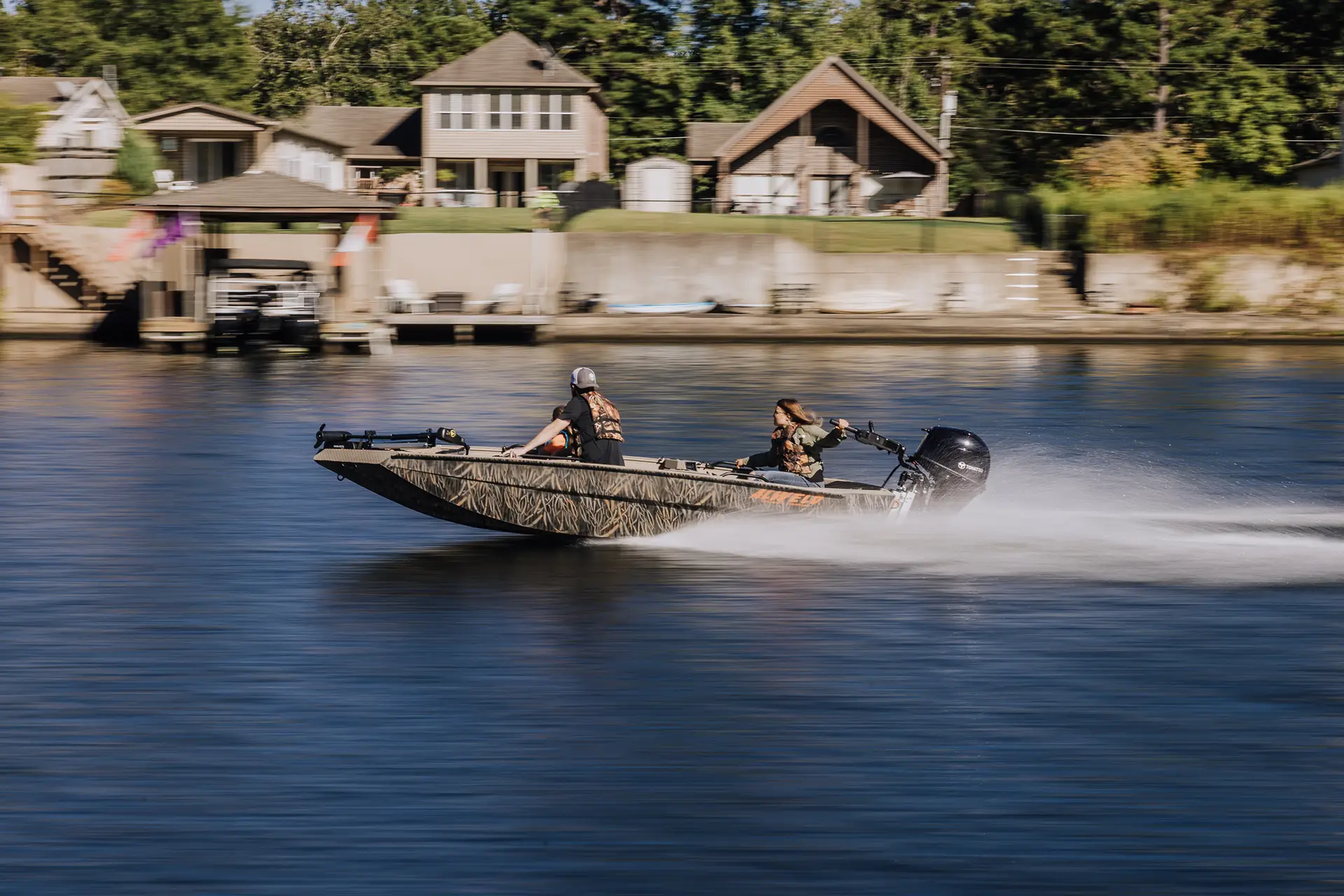 An Alweld boat cruising on the water